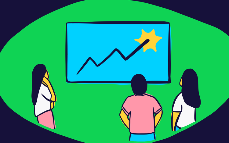 Teams looking at chart measuring growth trends